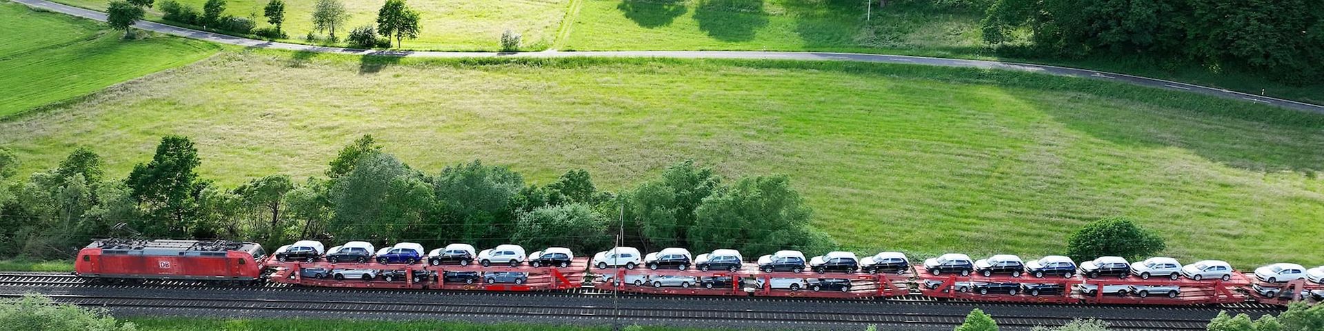 Train transporting new cars on the Automotive RailNet